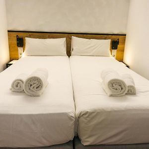Kleine Kamer met Twee Aparte Bedden